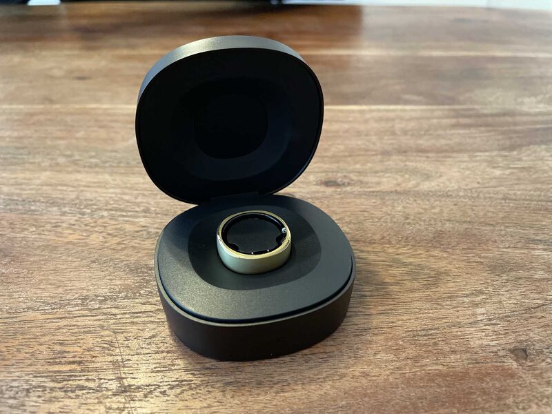 RingConn charging in the wireless case.