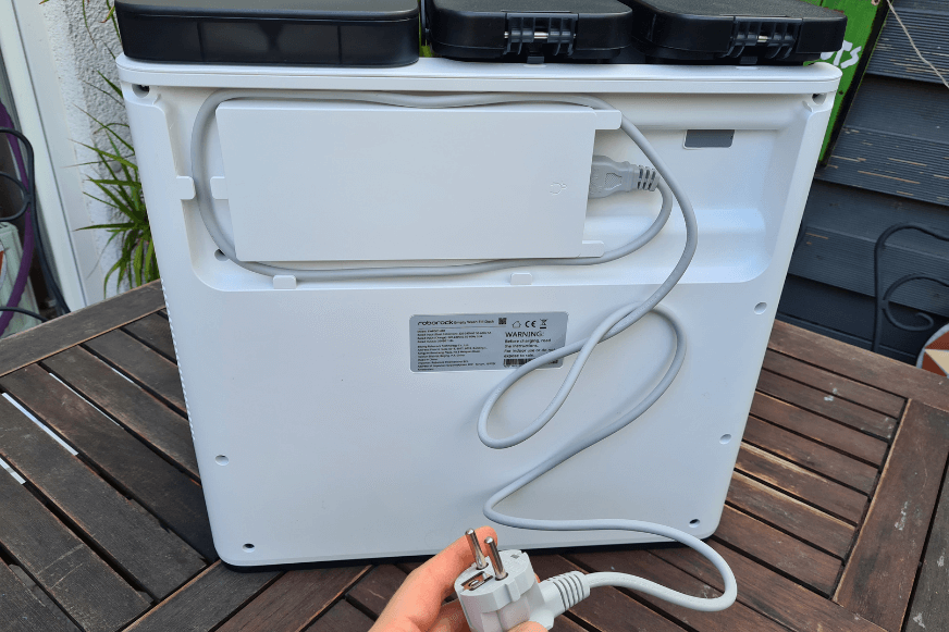 The cable management system of the Roborock S7 Pro Ultra's charging station can be seen from the back.