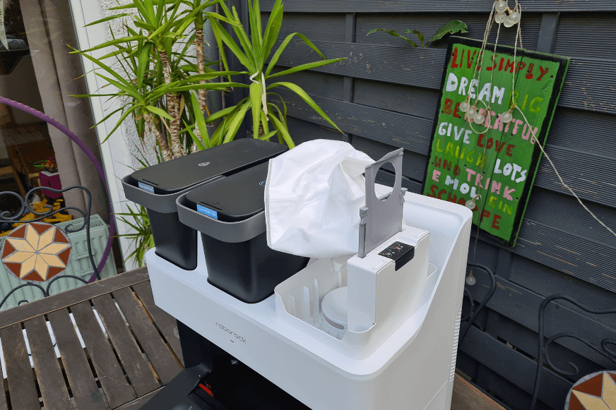 The Roborock S7 Pro Ultra Station's disposable dust bag can be seen.
