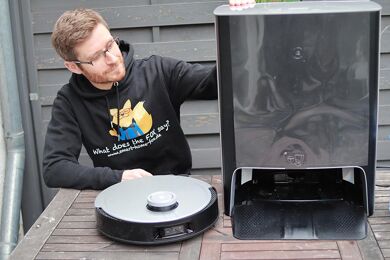 All the elements of the Ecovacs Deebot X1 OMNI are on the table before testing the device.