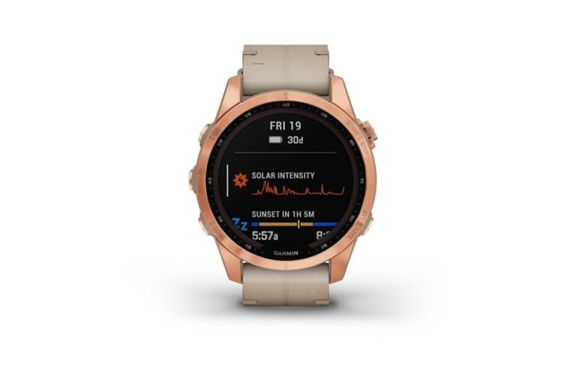 You can see the side buttons of a sports watch.