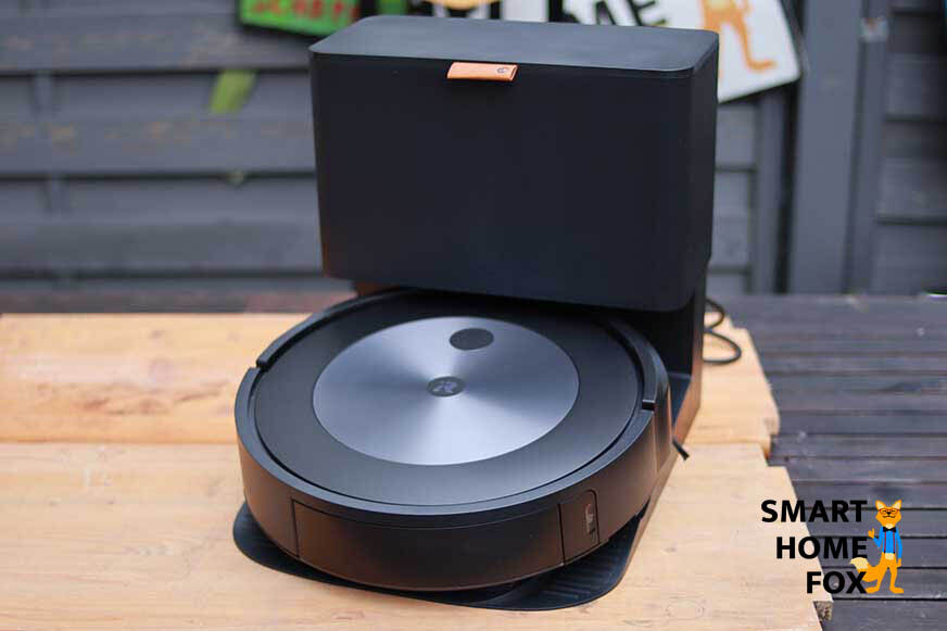 iRobot Roomba j7+ stands on a table during the test at the extraction station.