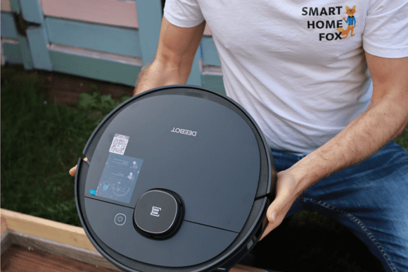 Ecovacs Deebot OZMO 950 Robot Vacuum Cleaner stands on the floor during the review